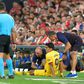 Suarez hobbled off injured in Barcelona's La Liga opener