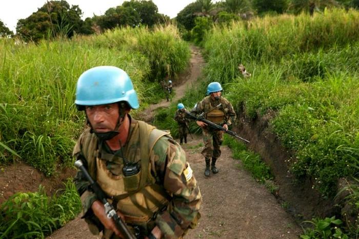 UN soldiers patrol the area surrounding the village of Kafe near Lake Albert in DR Congo's Ituri province, on March 27, 2018
