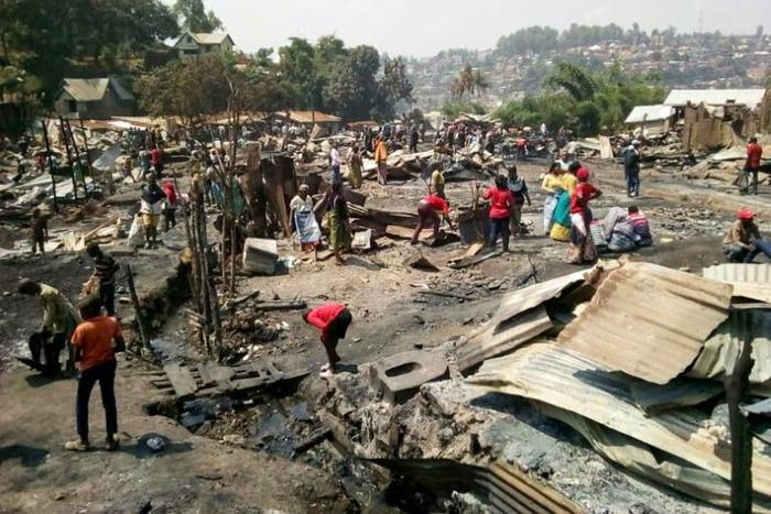 A massive fire sparked in a house where a woman fried donuts near cans of petrol, razed more than 150 homes in the eastern DR Congo, killing a seven-year-old girl.