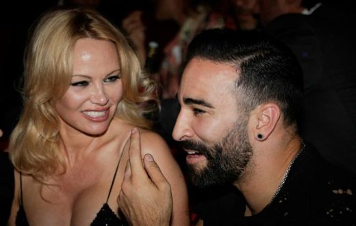Pamela Anderson and France World Cup-winning player Adil Rami at the Crazy Horse cabaret in Paris on June 3