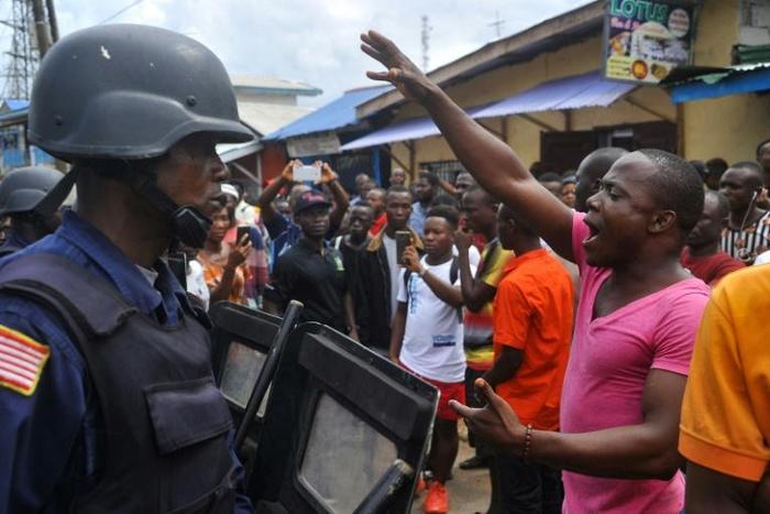 Anti-government protesters confronted police on Wednesday ahead of the demonstration