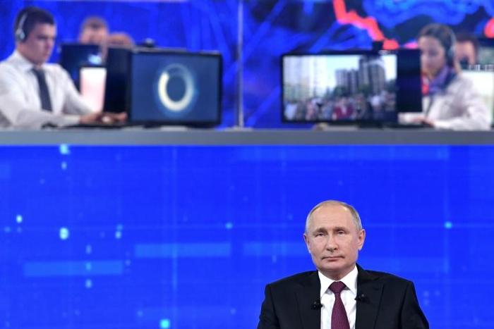 Russian President Vladimir Putin faced screened questions posed by Russian viewers at the annual televised phone-in