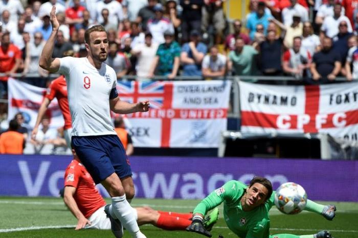 England captain Harry Kane (left) could not find a way past Swiss goalkeeper Yann Sommer (right)