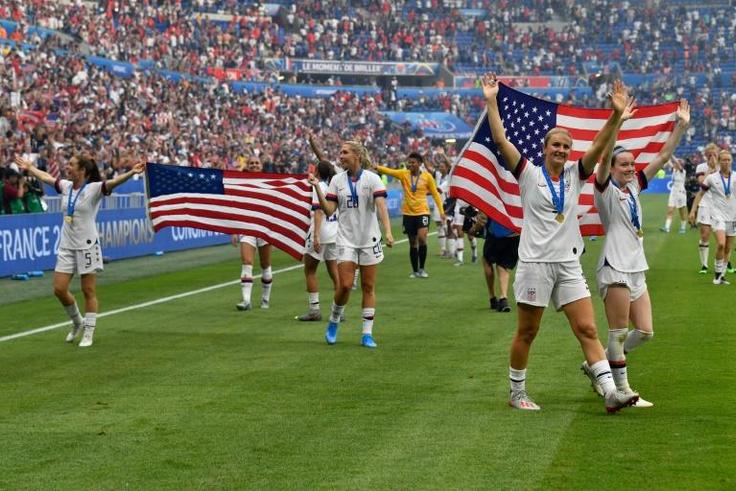 The US women celebrate their victory in the 2019 women's World Cup football final match between the US and the Netherlands in Lyon