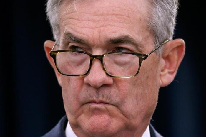 Federal Reserve Chairman Jerome Powell says trade tensions pose a risk to growth, but the central bank will act to ensure the US economic expansion continues