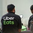 The green part of Uber Eats' logo, pictured here on a delivery driver, will be changed on the Marseille team's jersey after fans complained it was too reminiscent of hated rival Saint-Etienne