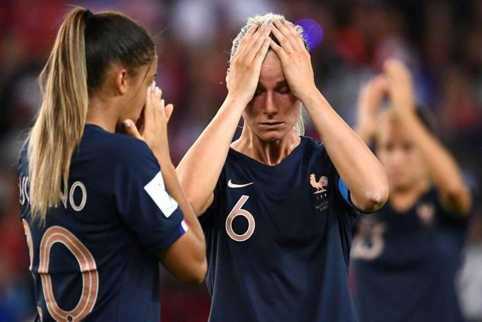 France skipper Amandine Henry (R) and teammate Delphine Cascarino are distraught at the end of the World Cup hosts' defeat against the USA on Friday