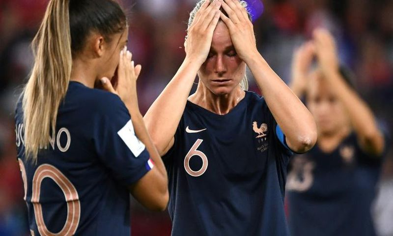 France skipper Amandine Henry (R) and teammate Delphine Cascarino are distraught at the end of the World Cup hosts' defeat against the USA on Friday