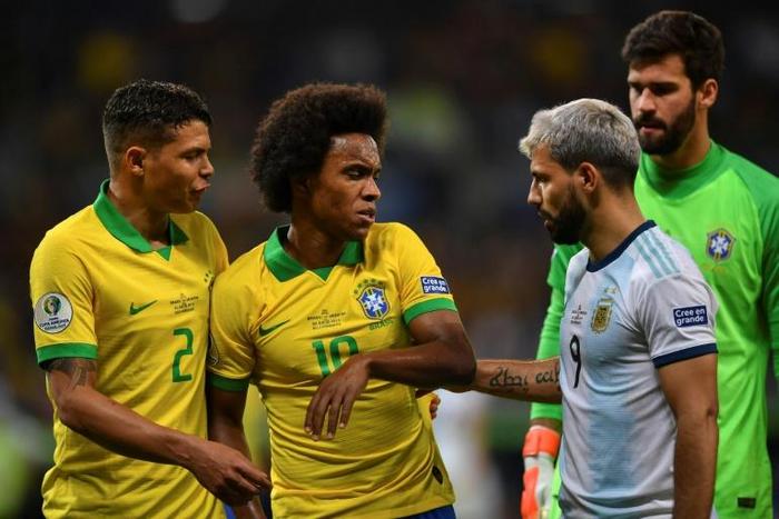 Willian (center) is out of the Copa America final after injuring his hamstring during the semi-final victory over Argentina