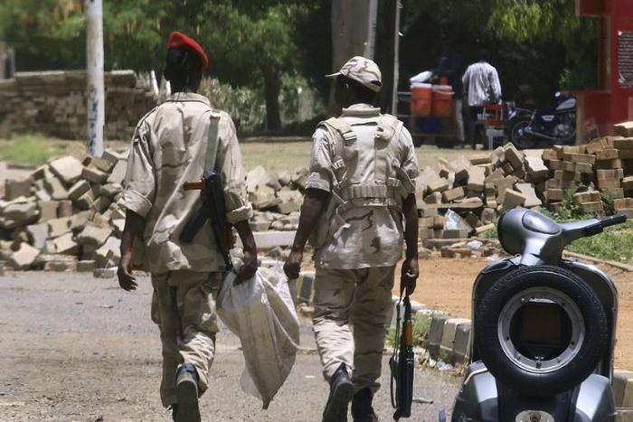 Members of Sudan's paramilitary Rapid Support Forces patrol Nile street in the capital Khartoum on June 10, 2019
