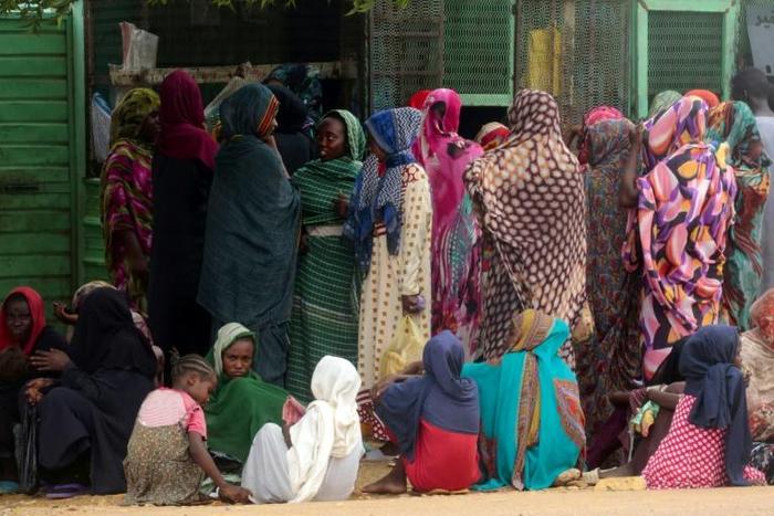 Women queue for hours outside a bakery in the Sudanese city of Al-Obeid where the chronic shortage of bread prompted a protest by schoolchildren in which five were shot dead