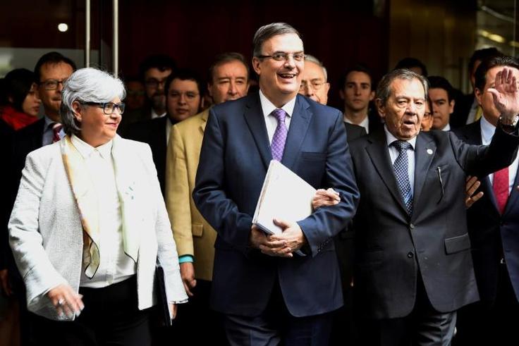 Mexican Foreign Minister Marcelo Ebrard (C) has asked the UN for a special envoy to coordinate efforts to stem the flow of migrants from Central America