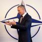 Acting US Secretary for Defense Mark Esper (l) greeted by NATO Secretary General Jens Stoltenberg in Brussels
