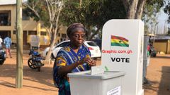 A voter casting her ballot
