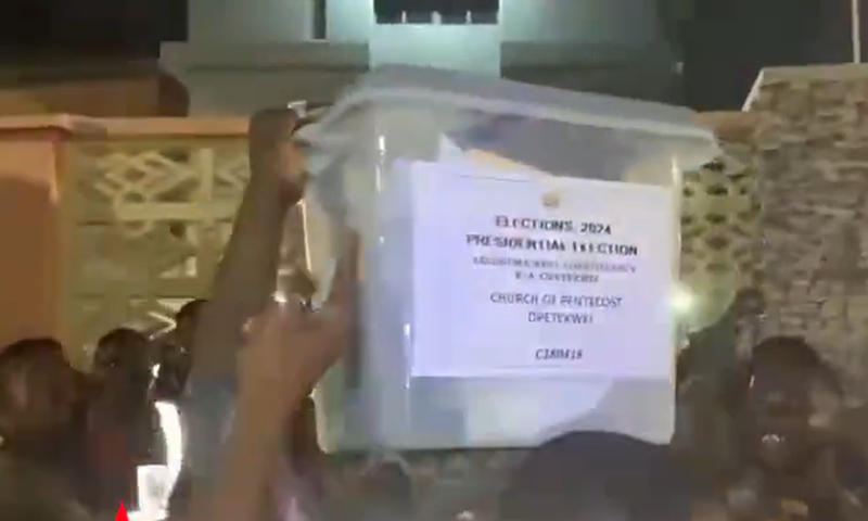 Angry crowd assaults police officer for trying to smuggle unsealed ballot boxes.