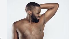 Man watching arrmpit (Shutterstock)