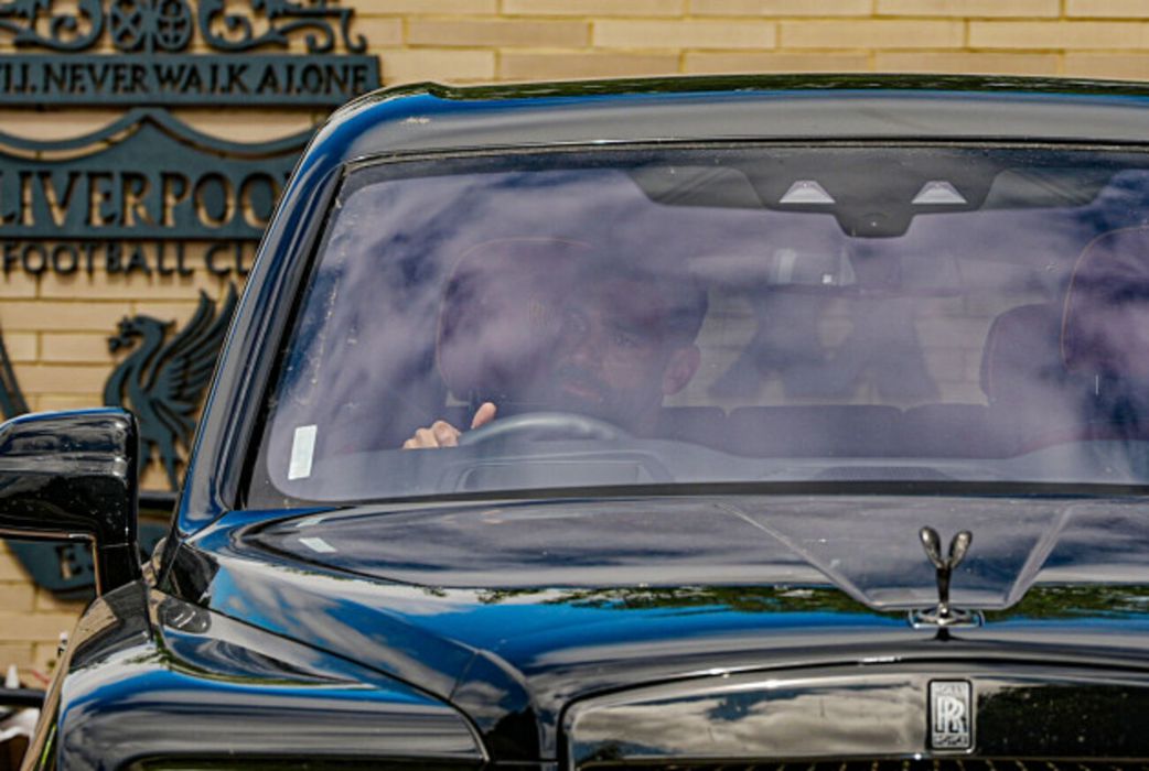 Mohammed Salah drives to Liverpool training