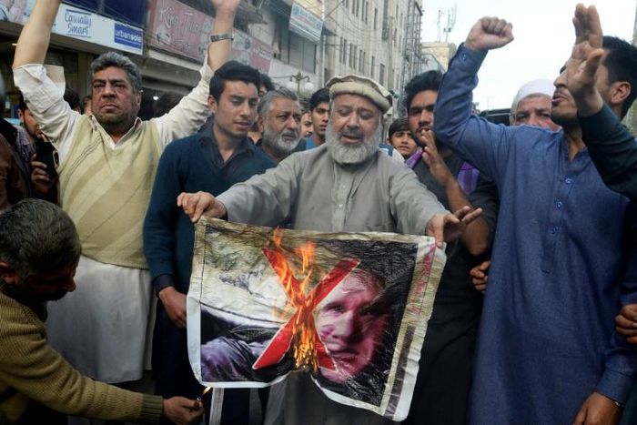 The shockwaves from the New Zealand mosque massacre have reverberated around the world with Pakistani traders burning a picture of the alleged gunman, a white supremacist