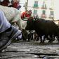 Participants take place in the San Fermin festival running of the bulls in Pamplona, northern Spain in July 2019