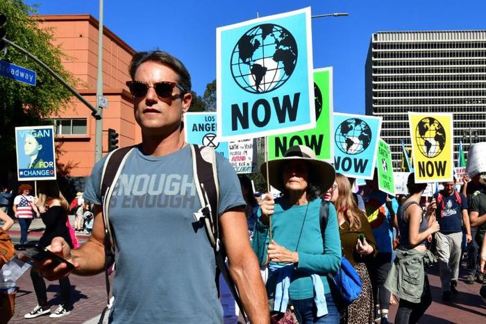 Activists march through downtown Los Angeles in November 2019 in a climate change rally addressed by teenage Swedish activist Greta Thunberg