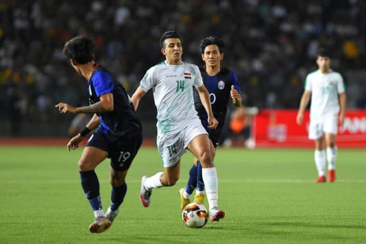 Iraq's forward Amjad Attwan Kadhim (C) scored a belter during his teams 4-0 thrashing of Cambodia