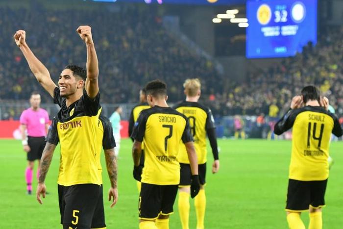 Achraf Hakimi hit two second-half goals to seal a stunning 3-2 come-back win for Borussia Dortmund on Tuesday at home to Inter Milan in the Champions League.