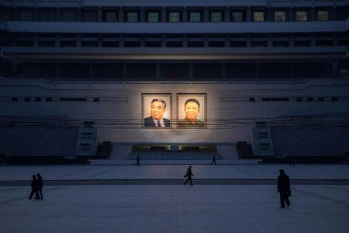 Portraits of late North Korean leaders Kim Il-Sung and Kim Jong-Il in Pyongyang. Despite sophisticated efforts to keep its economy afloat, UN sanctions are hurting