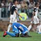 Napoli's Senegalese defender Kalidou Koulibaly reacts after scoring an own goal during the Italian Serie A football match Juventus vs Napoli at the Juventus stadium in Turin