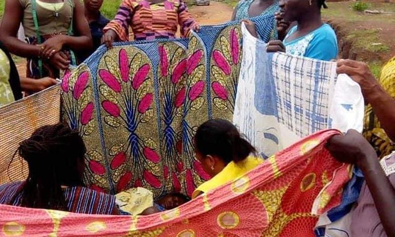 Woman in labour delivers baby on the road