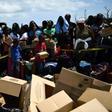 Bahamians waiting to be evacuated from the dock at Marsh Harbour, on the island of Abaco, which was devatsted by hurricane Dorian