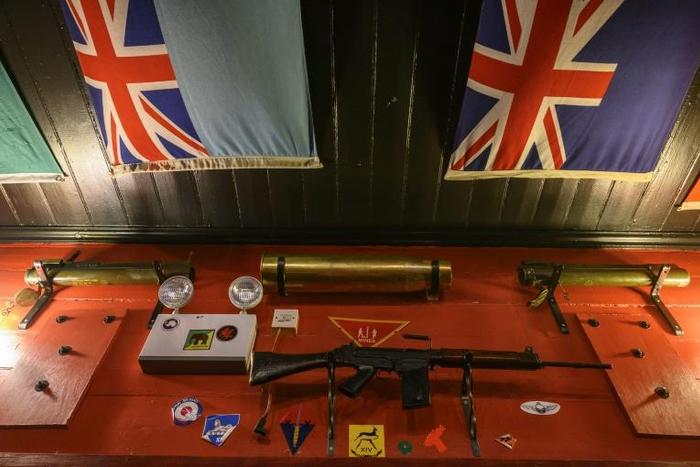 War memorabilia found on 1982 Falkland War's battle fields is displayed at The Globe Tavern in Stanley