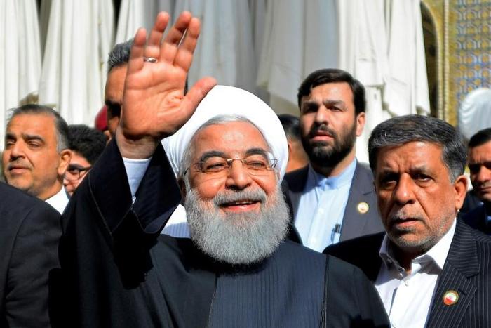 Iranian President Hassan Rouhani visits the Shiite holy city of Najaf during a March 2019 trip to Iraq