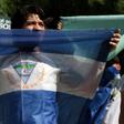 Nicaraguan students call for the immediate release of opposition prisoners after the government agreed to do so within 90 days, paving the way for a resumption of peace talks