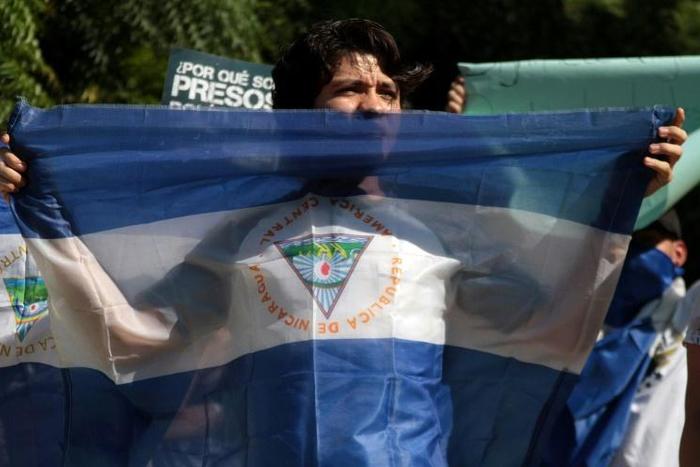 Nicaraguan students call for the immediate release of opposition prisoners after the government agreed to do so within 90 days, paving the way for a resumption of peace talks
