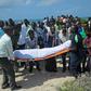 Relatives and fellow journalists pray as they stand next to the body of journalist Abdulaziz Ali Haji during his 2016 funeral in Somalia, described by a watchdog group as the worst country for enabling impunity for deadly attacks on media