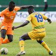 Ivory Coast's Pepe vies for the ball with Rwanda's Emmaunel Imanishimwe