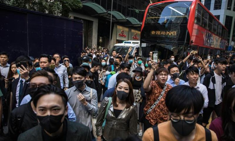 Hong Kong was again rocked by widespread protests, with reports of a man set ablaze after he criticised democracy activists