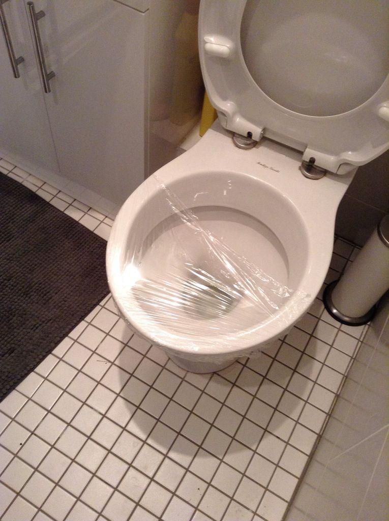 cling film your toilet seat