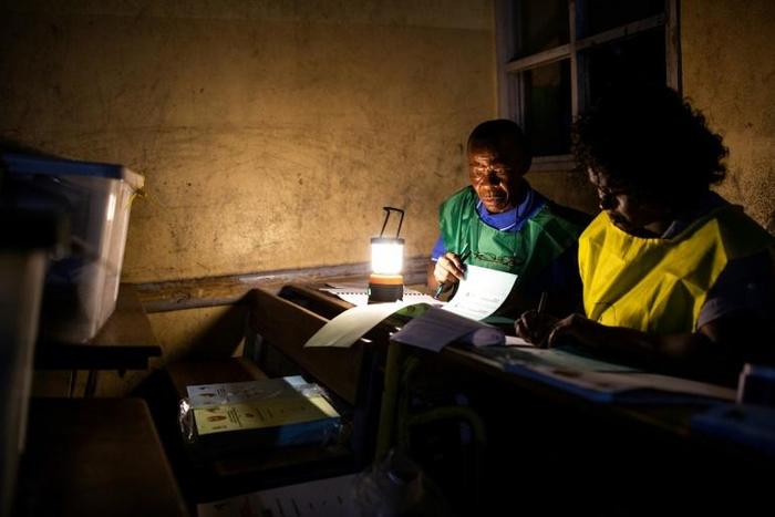 National Electoral Commission (CNE) officials published partial results from the high-stake general election on Friday