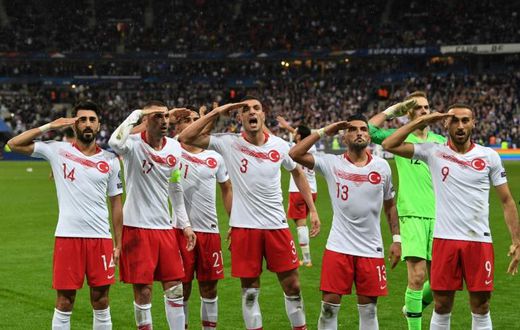 Turkey players performed a military salute in front of their supporters after scoring in Monday's 1-1 draw with France and again at the end of the game