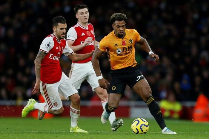 Wolves winger Adama Traore (right) was called up to the Spain squad on Saturday