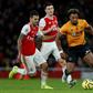 Wolves winger Adama Traore (right) was called up to the Spain squad on Saturday