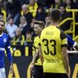 Borussia Dortmund captain Marco Reus (R) is shown his team's first of two red cards in April's derby when Schalke ran out 4-2 winners