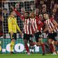 Sheffield United striker Lys Mousset (2nd L) celebrates the winner against Arsenal