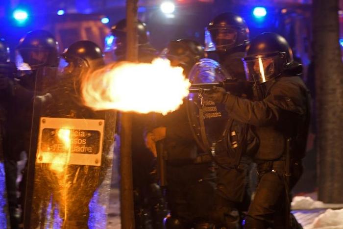 Anti-riot police in action against pro-separatist demonstrations in Catalonia on October 17