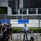Pro-democracy activist Joshua Wong speaks to the media outside the Legislative Council in Hong Kong after learning he had been barred from standing in upcoming local elections
