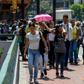 Commuters unable to use the subway due to a partial power cut, flock to the streets in Caracas
