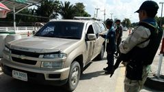 Armed civil defence volunteers and police have been searching vehicles at checkpoints in the southern province of Narathiwat