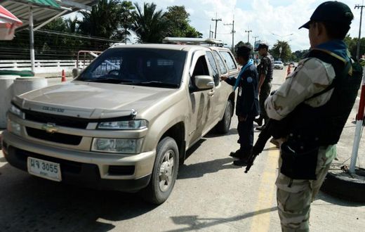 Armed civil defence volunteers and police have been searching vehicles at checkpoints in the southern province of Narathiwat