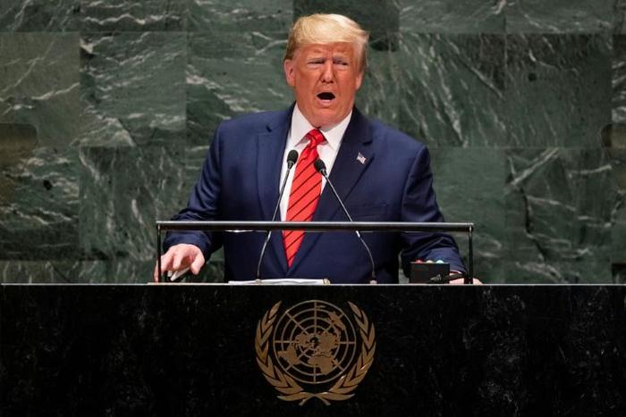 Embattled: US President Donald Trump addresses the United Nations General Assembly as calls for his impeachment mount